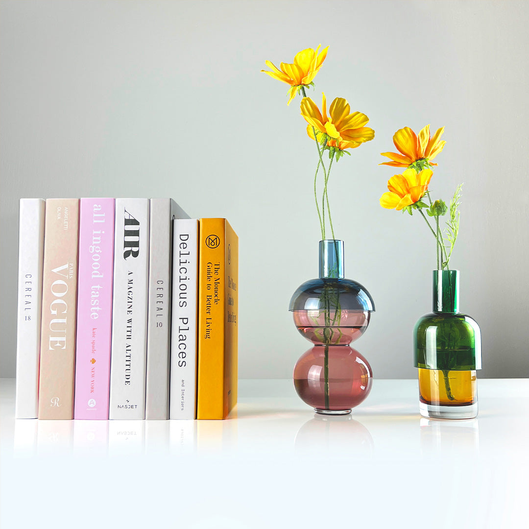 Fusion Cherry Vase Set beside books