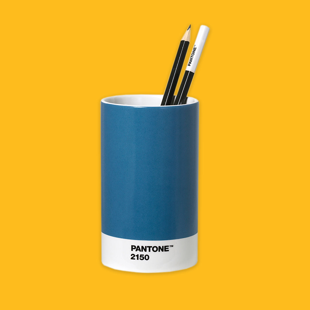 Blue PANTONE pencil holder with two pencils on a yellow background