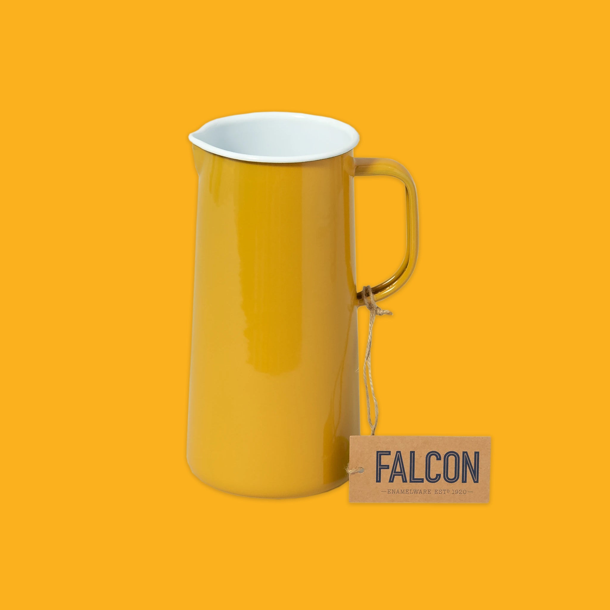 Yellow pitcher with a white interior on an orange background, featuring the brand 'Falcon'.