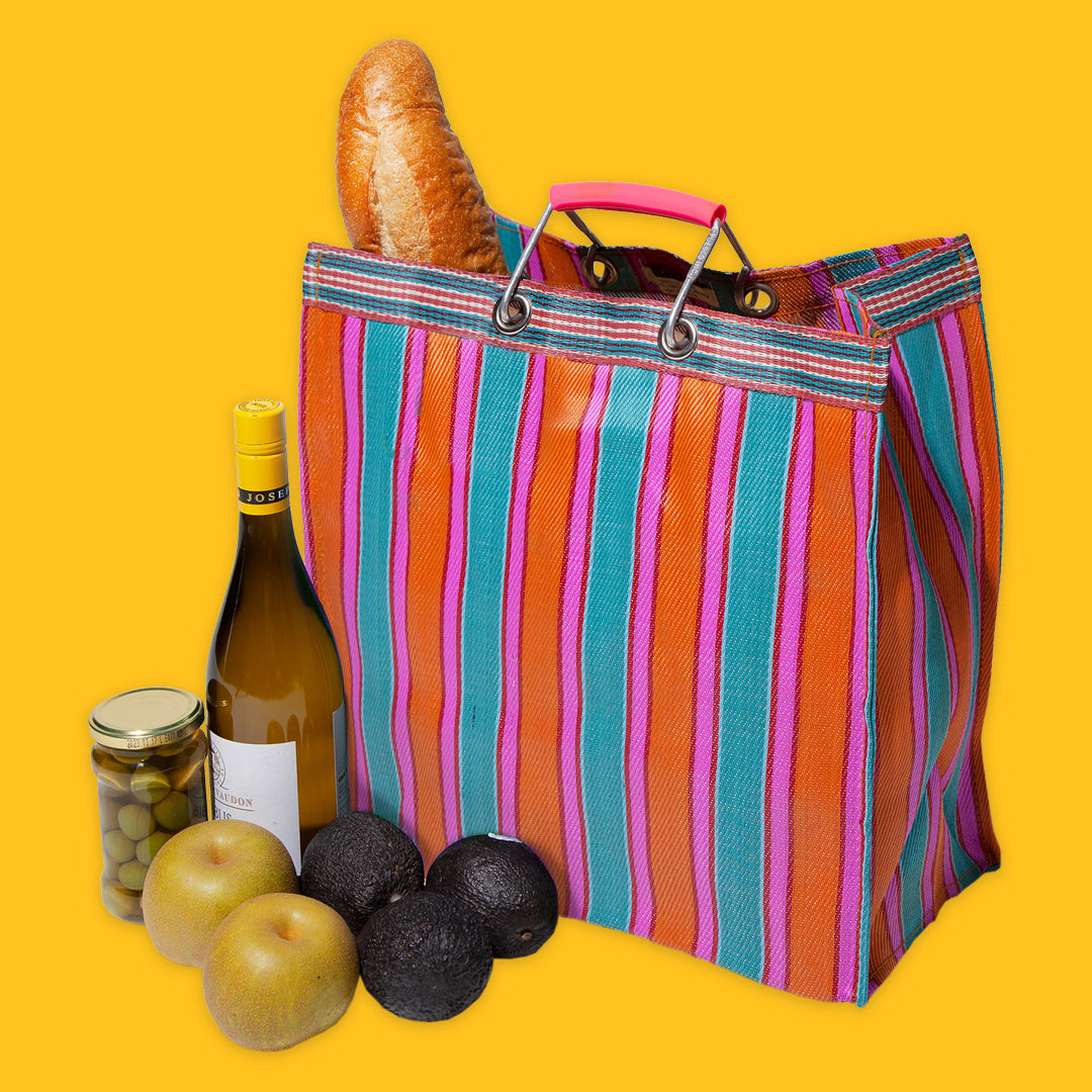 Puebco Stripe Bag Square in Orange & Pink with groceries