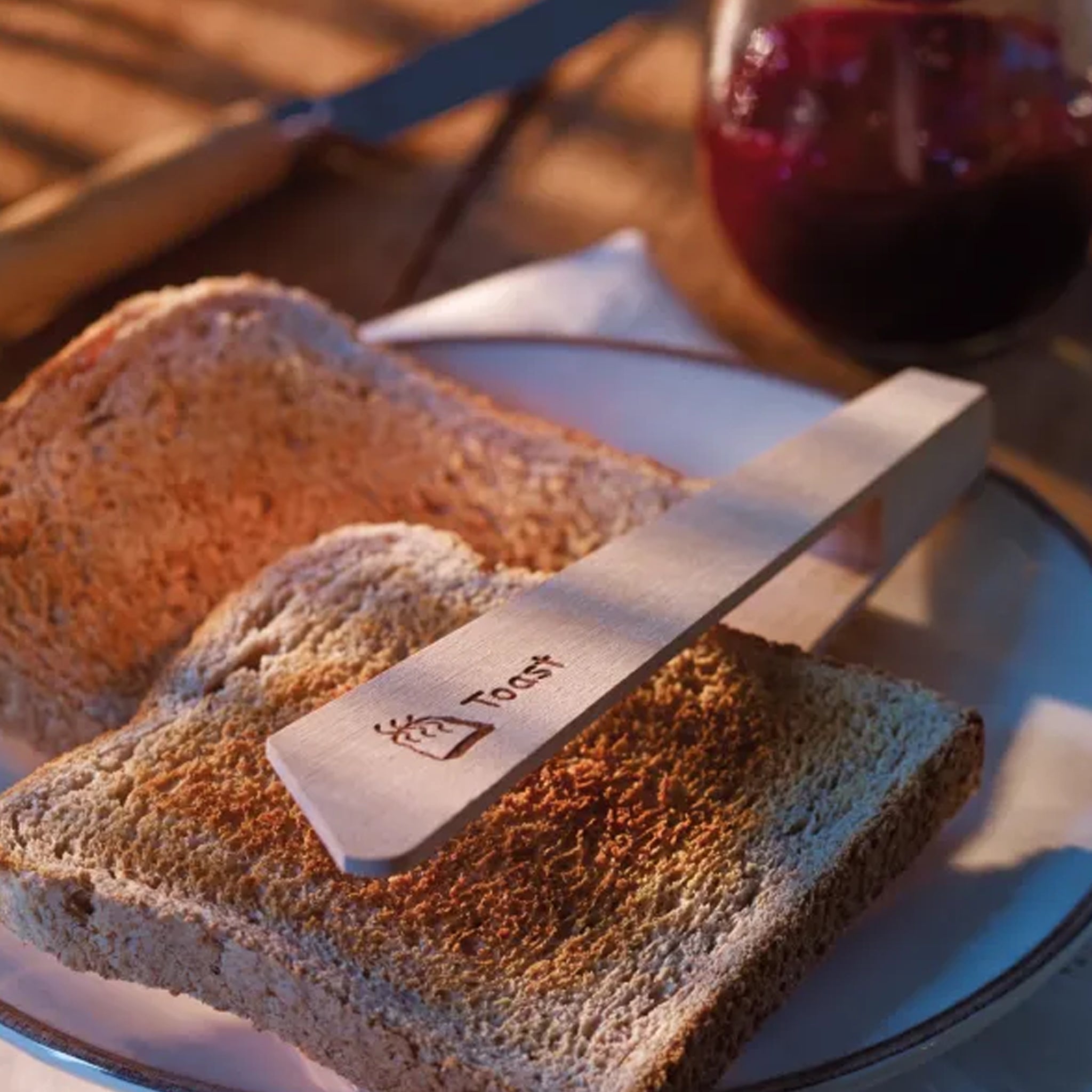 Toast tongs with slices of toast