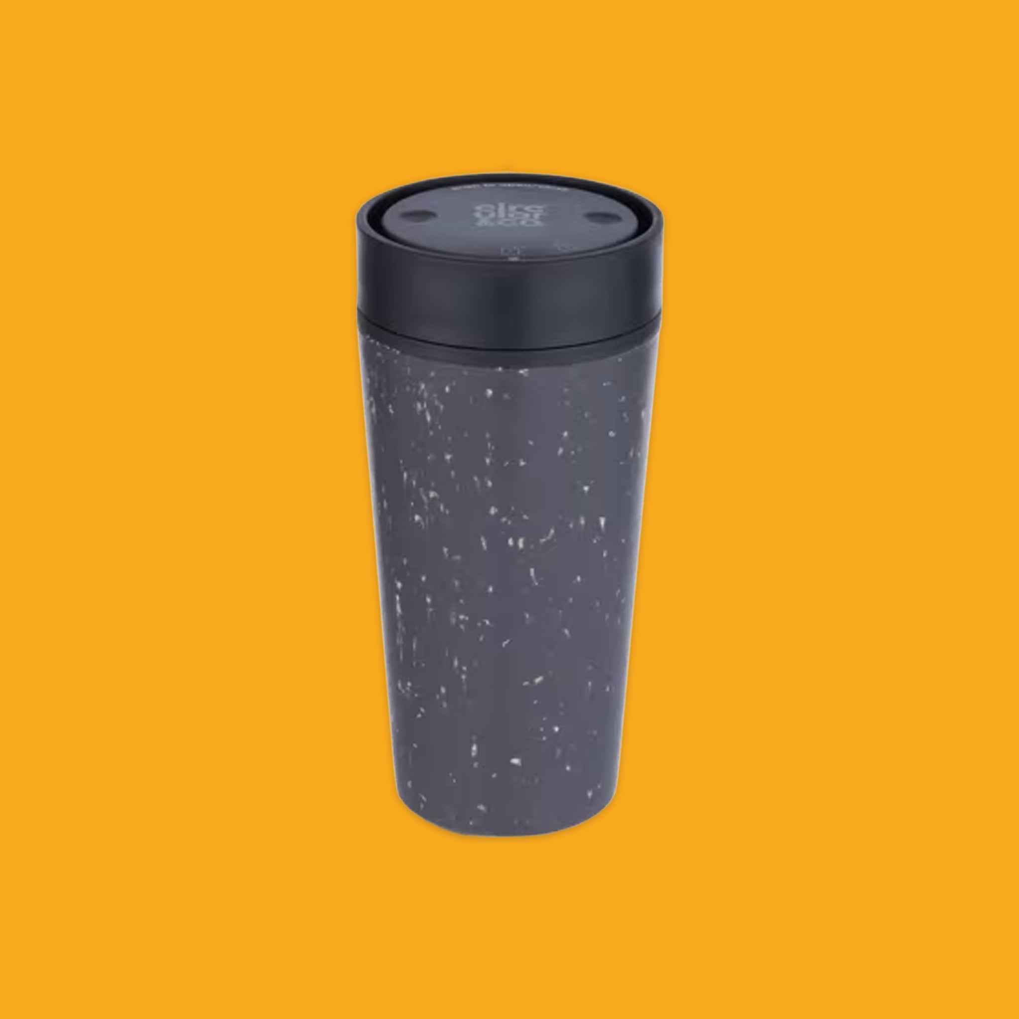 Speckled gray travel mug with black lid on a mustard yellow background