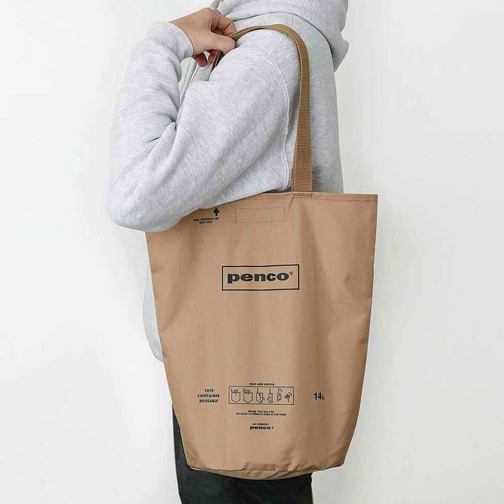 Hightide Penco Bucket Tote Bag in Beige on shoulder