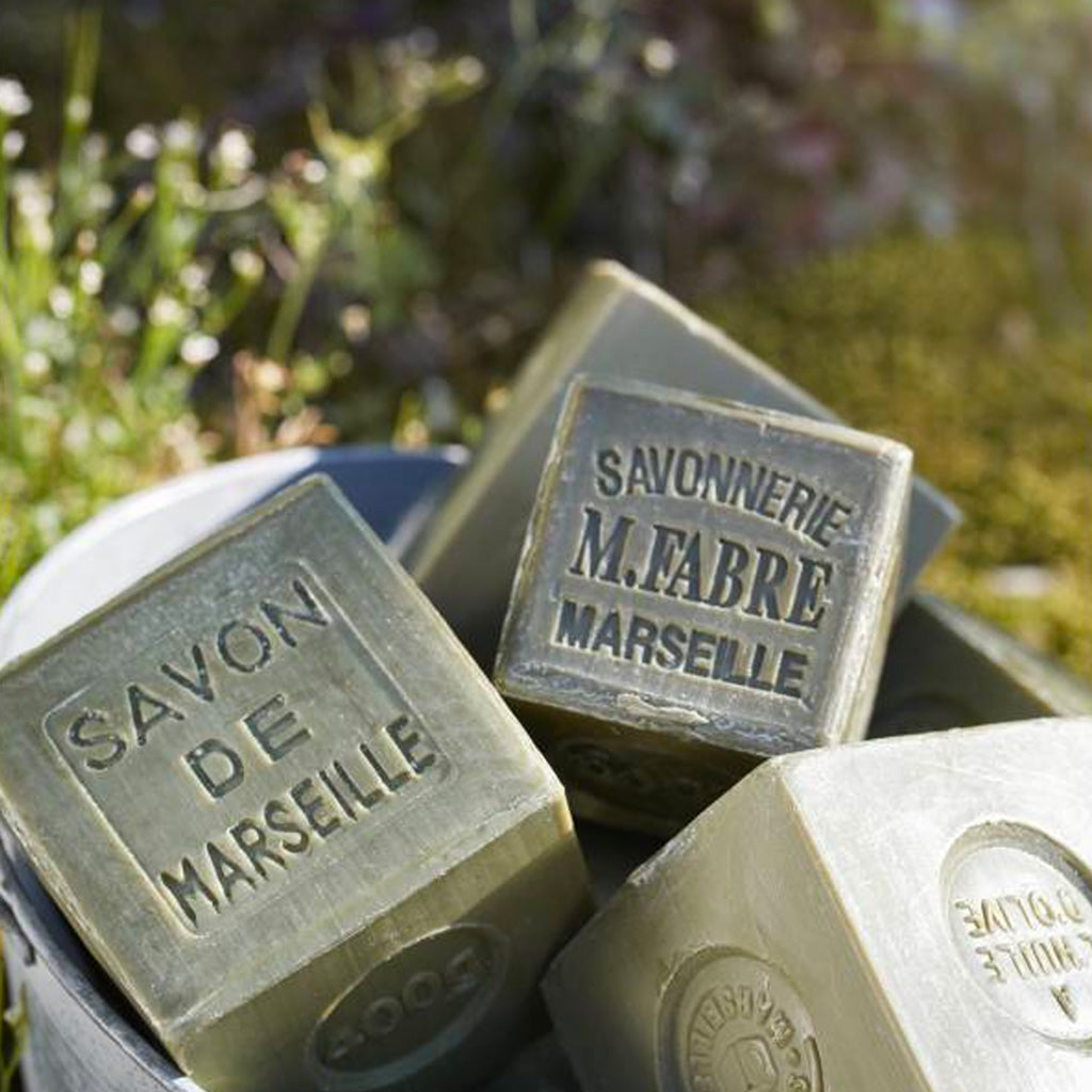 Marius Fabre Marseille Soap in a bucket in a garden