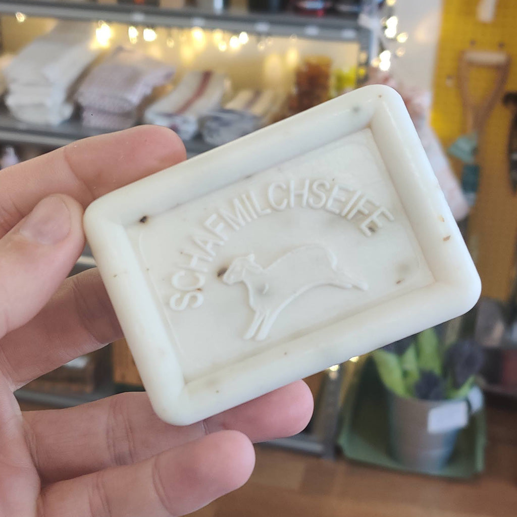 Hansen Ovis Sheeps Milk Soap Bar in hand