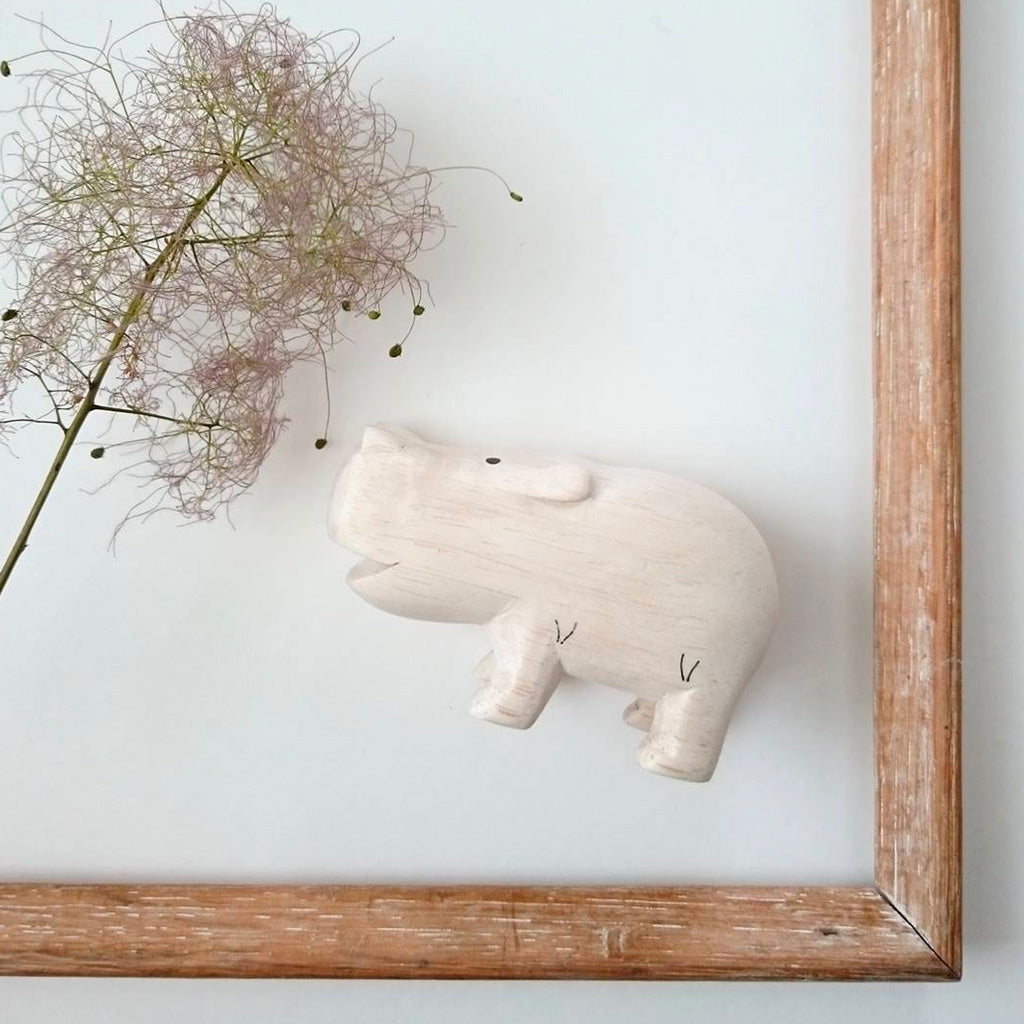 T-Lab Pole Pole Hippopotamus on display in a frame