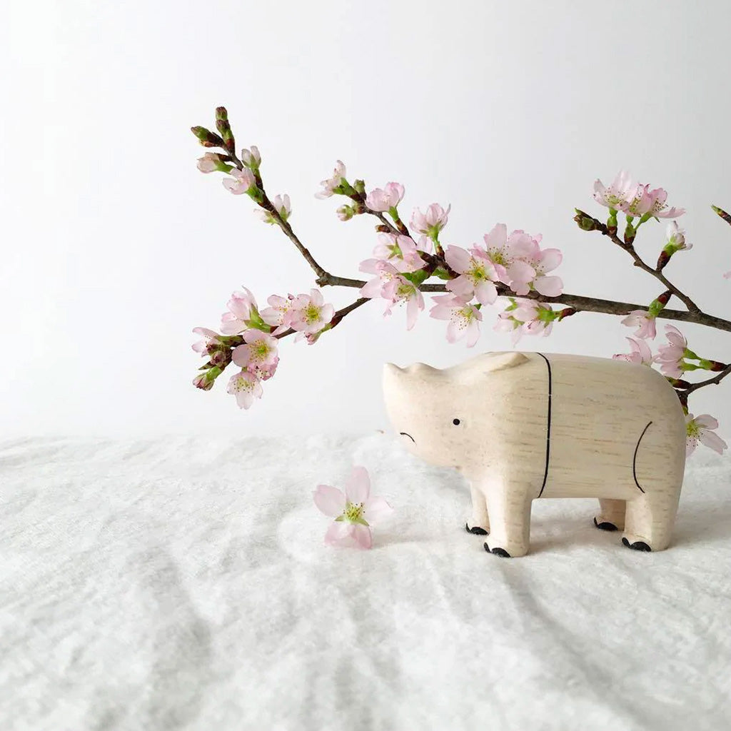 T-Lab Pole Pole Rhinoceros on display with cherryblossom