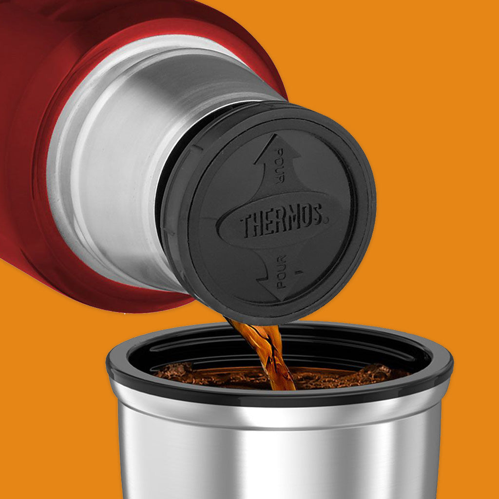 Thermos 1.2L Stainless Steel Flask in Cranberry Red Pouring Coffee