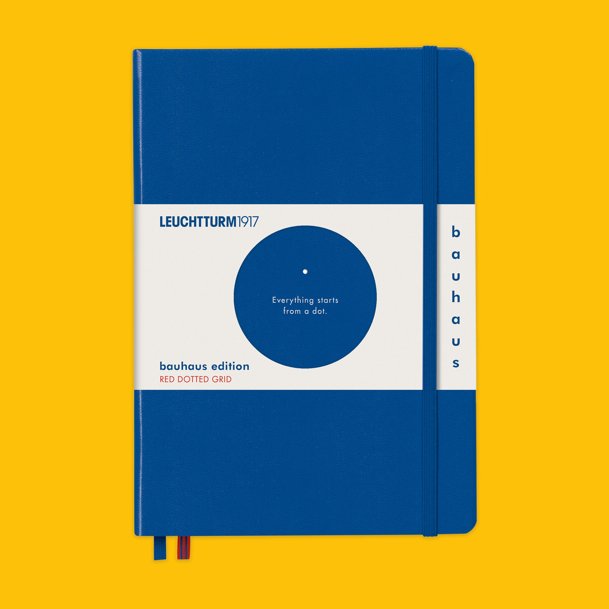 Blue Bauhaus notebook with white label on a yellow background