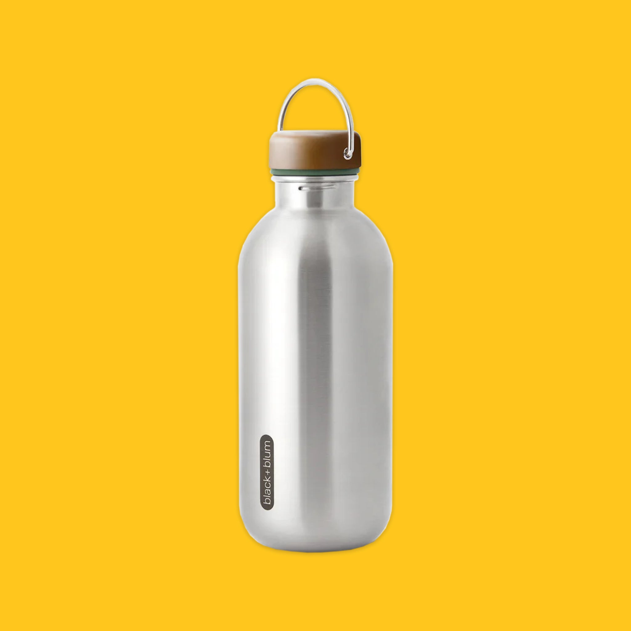 Steel bottle on a yellow background
