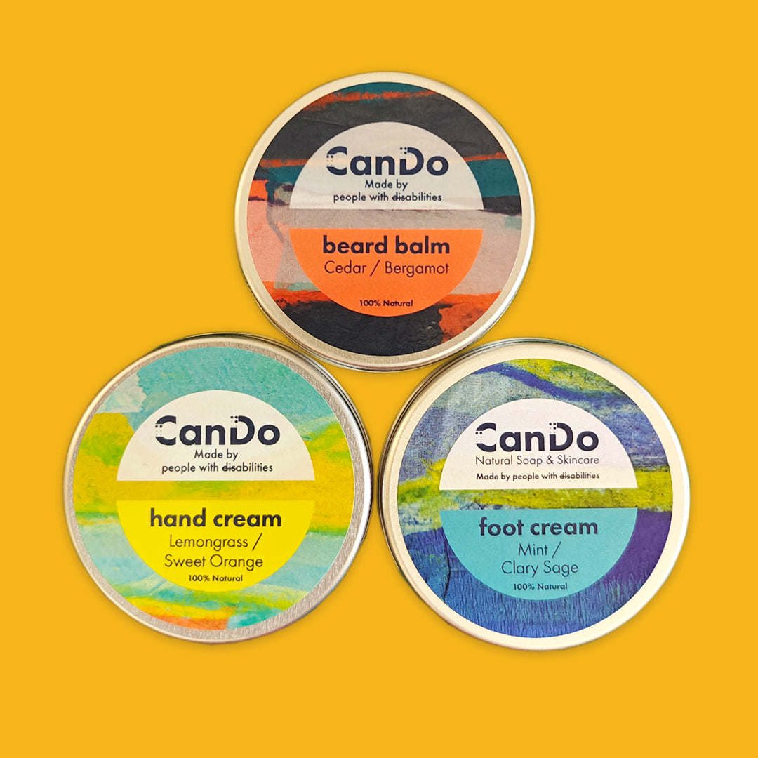 Three tins of CanDo products on a yellow background