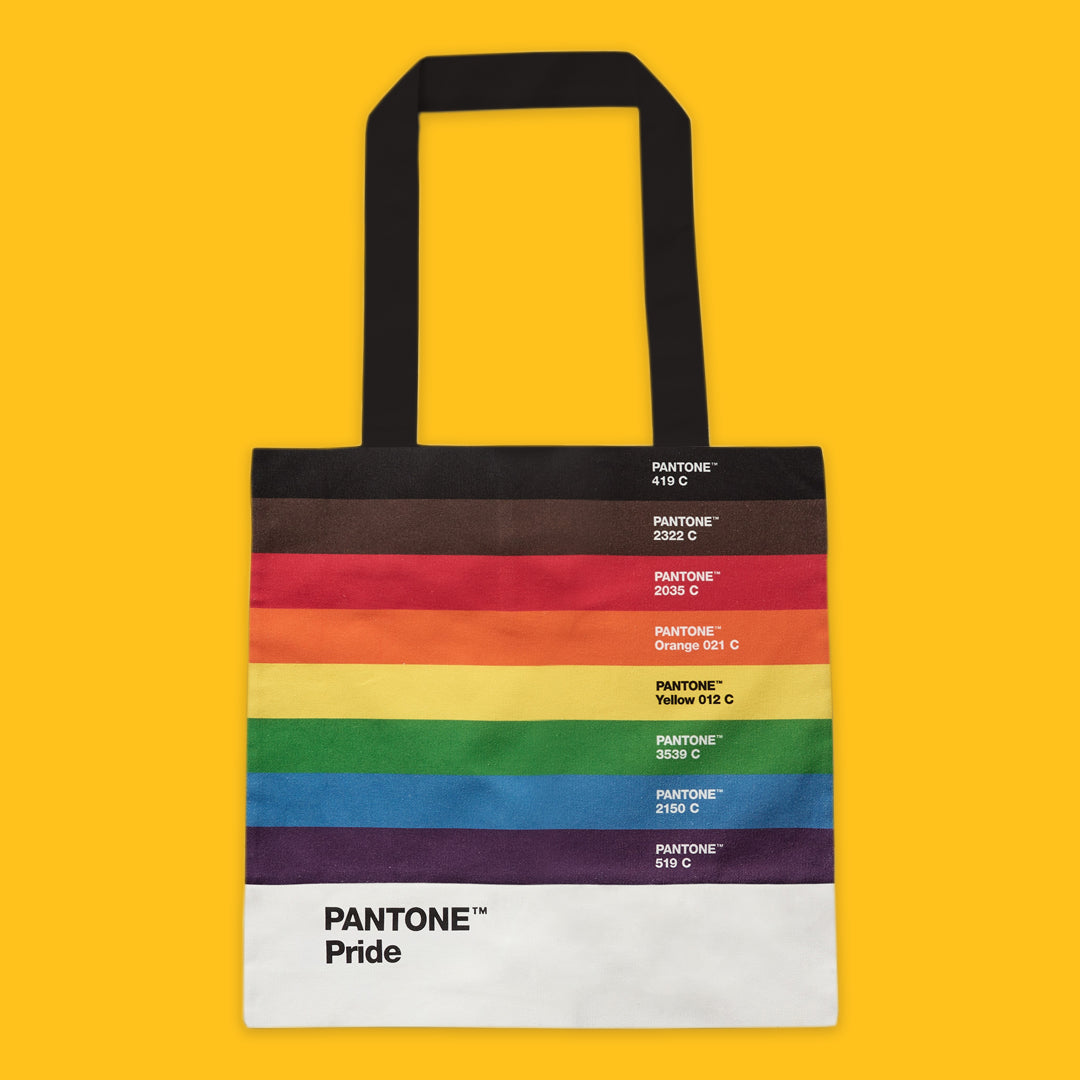 Tote bag with Pantone Pride colours swatches on a yellow background
