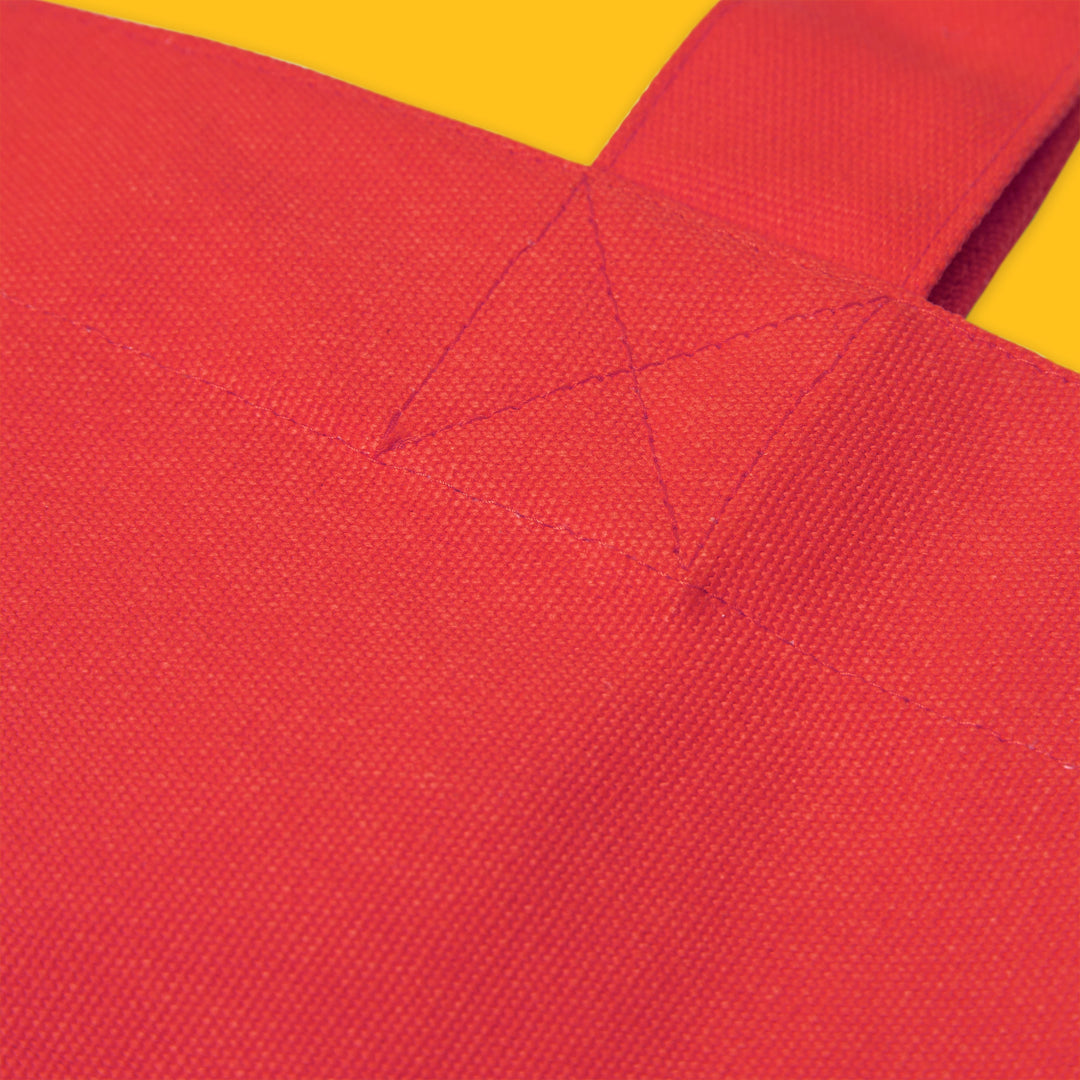Close-up of a red fabric with yellow background