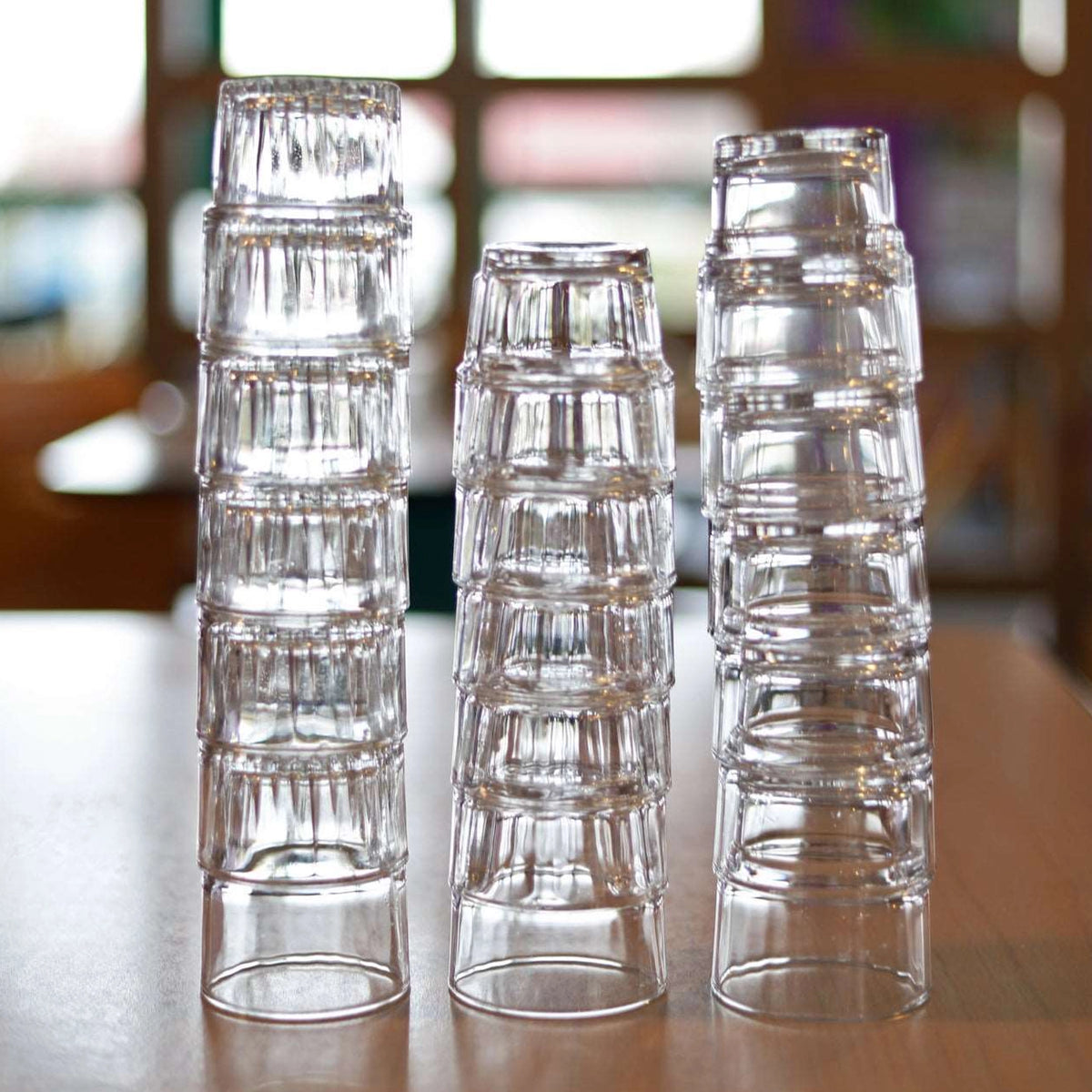 Stacks of glasses on a table.