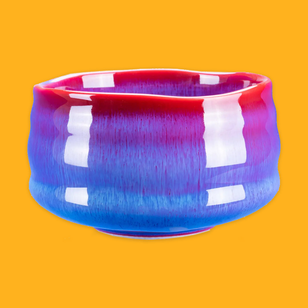 Red and Blue match bowl on a yellow background