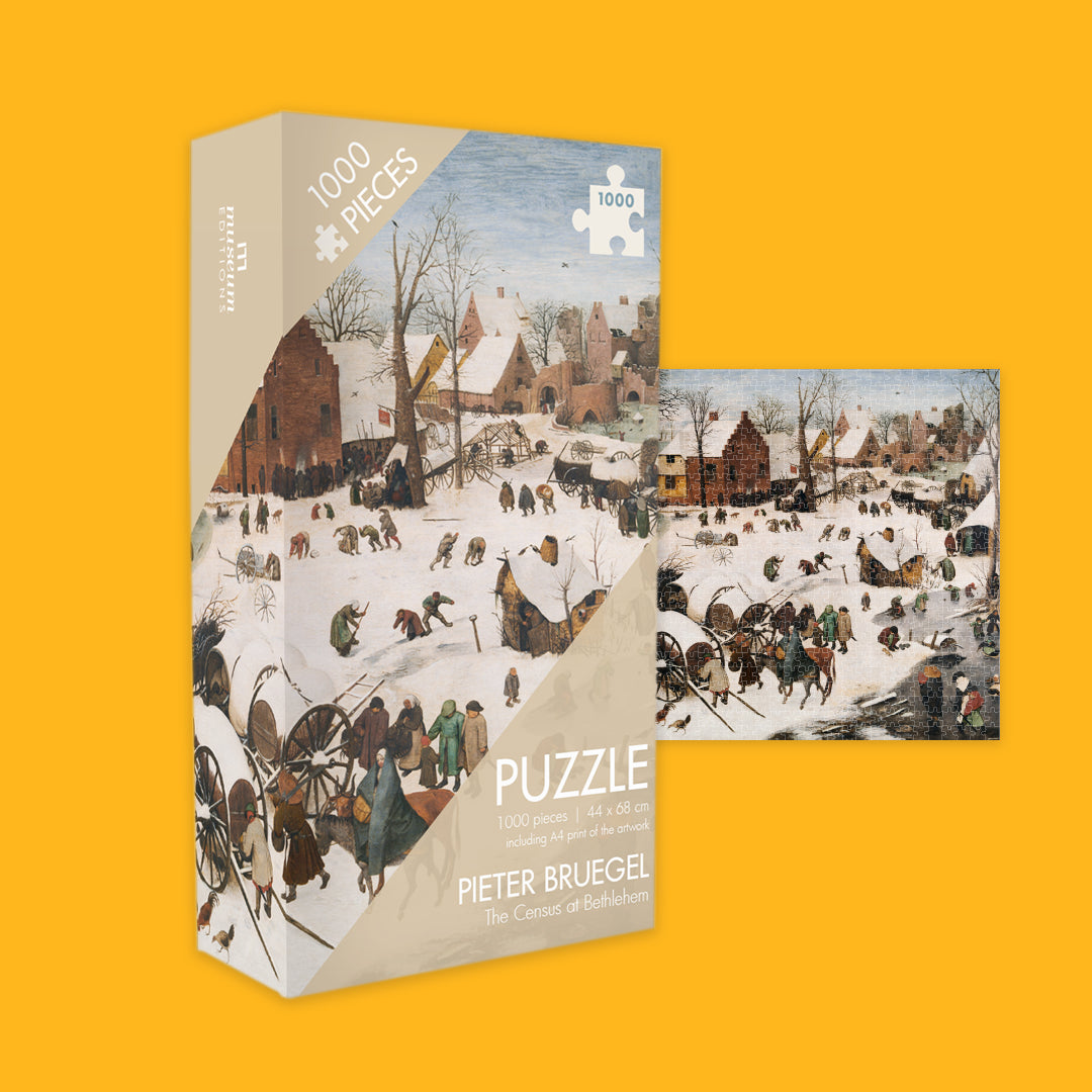 Jigsaw puzzle packaging with a winter scene design on an orange background