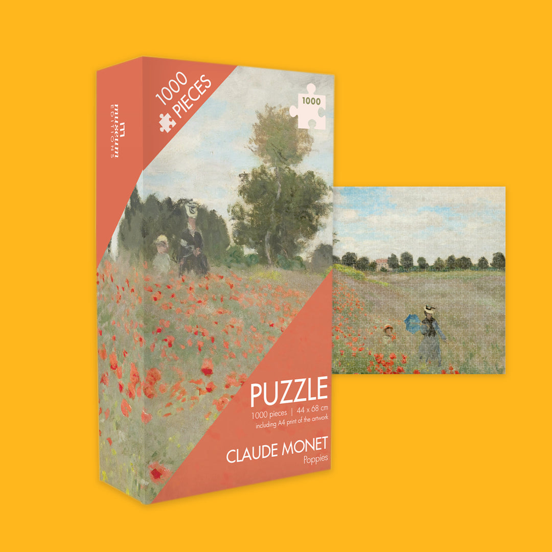 Jigsaw puzzle box featuring a painting by Claude Monet on a yellow background