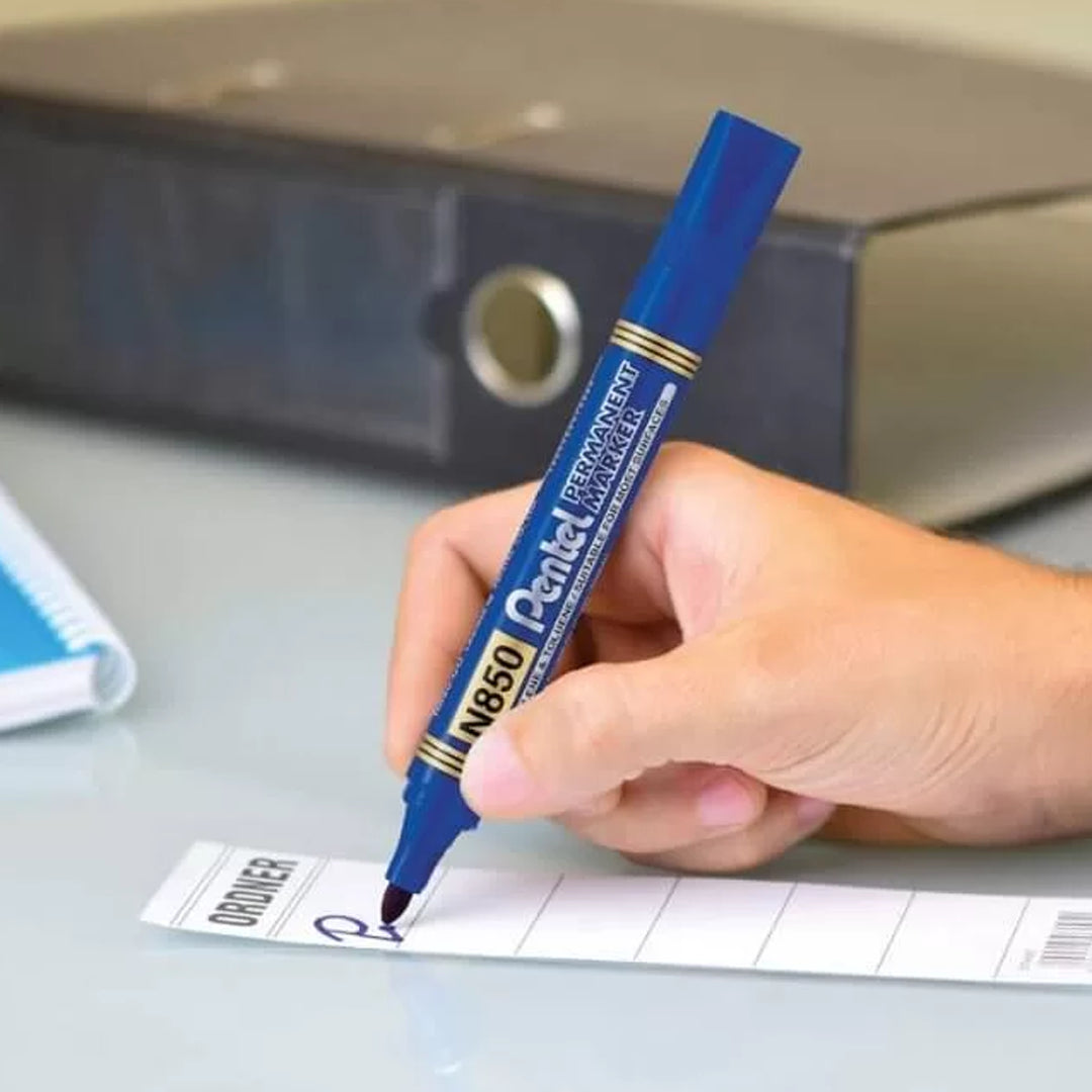 Pentel blue permanent marker being used
