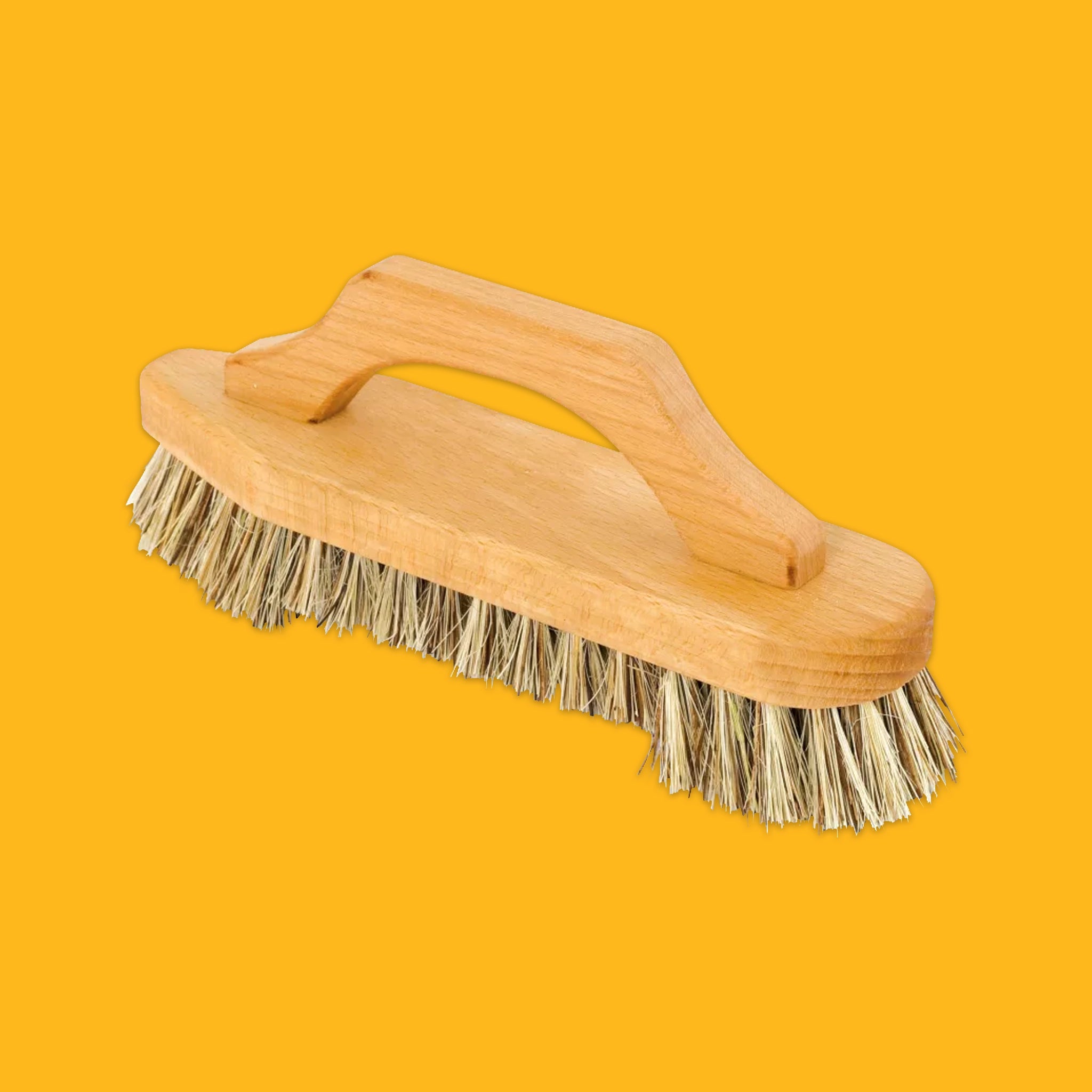 A wooden cleaning brush with a natural wood handle and light beige bristles, shown on a solid yellow background.