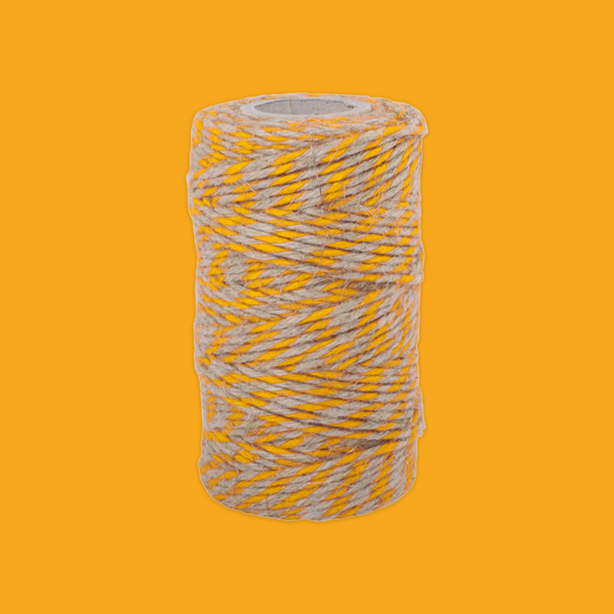 Roll of twine with gray and yellow pattern on a yellow background