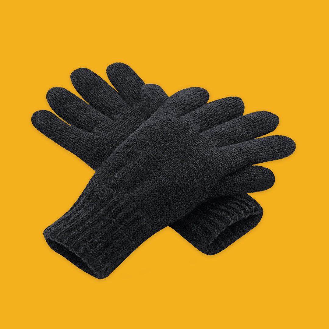 Pair of black Thinsulate™ gloves on a yellow background
