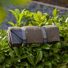 Fleece Picnic Rug Roll in Sage on a bush