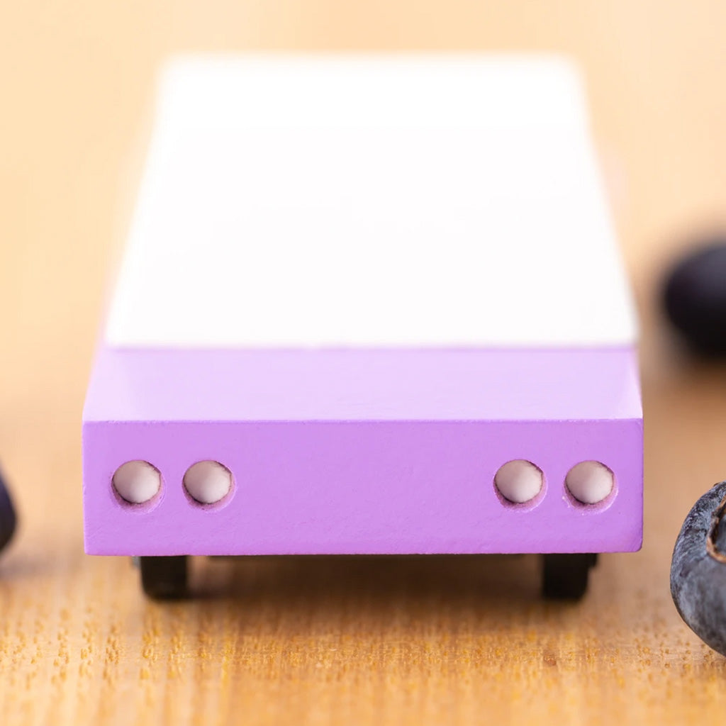 B.Berry Suburbia Toy Car By CandyLab amongst blueberries