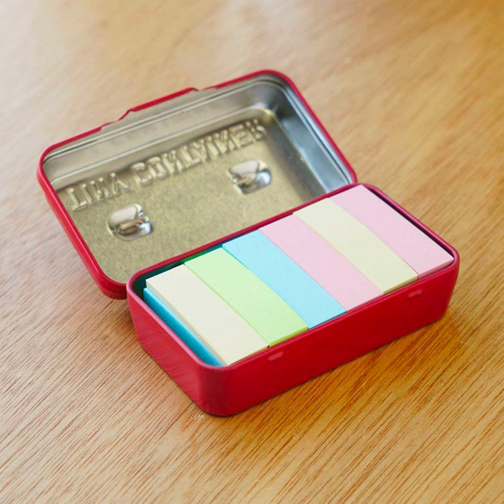 Penco Tiny Contain Desk Organiser in red with items inside on a desk