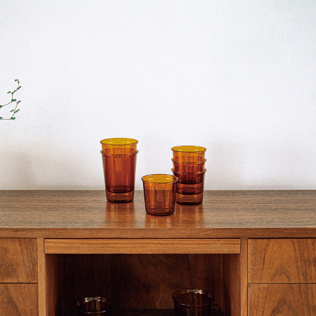 Kinto Cast Amber Glass Stacked on a table