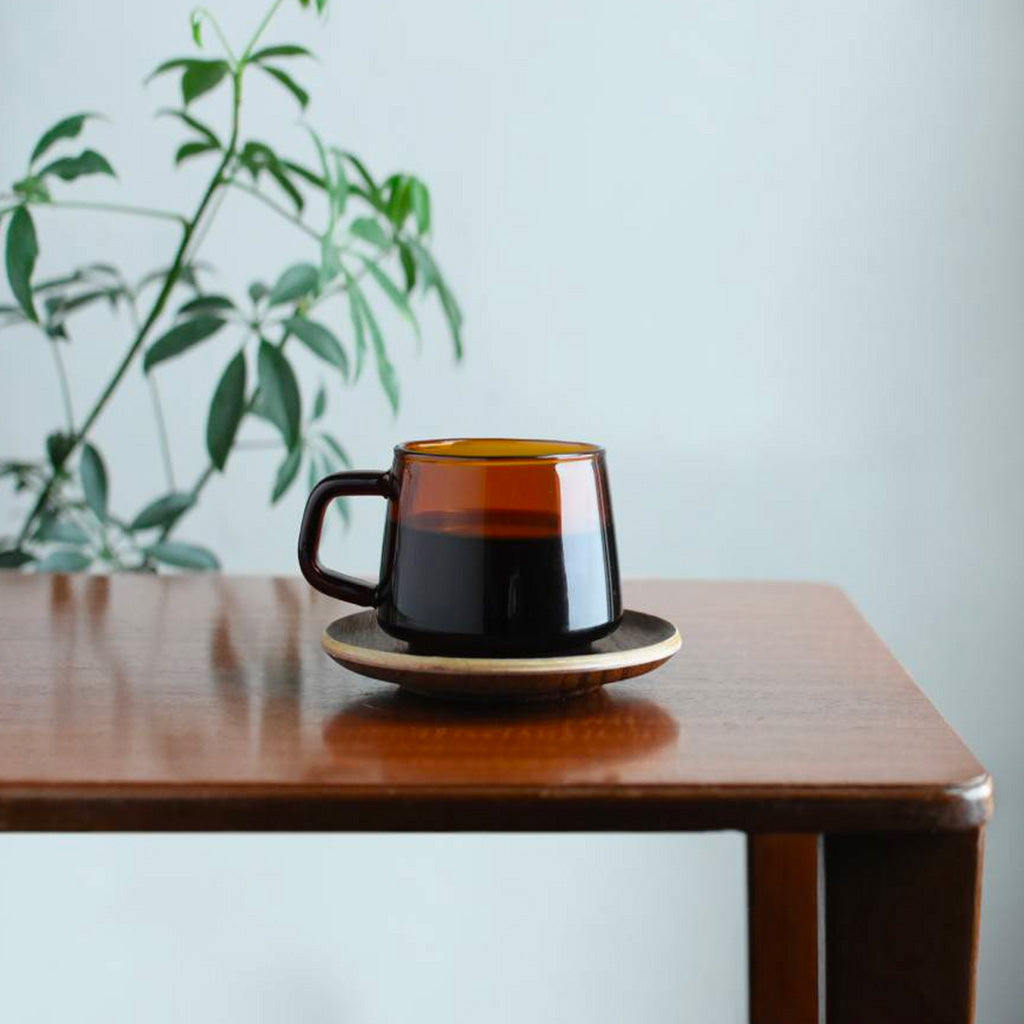 Kinto Sepaia 340ml Mug on display with coffee on table