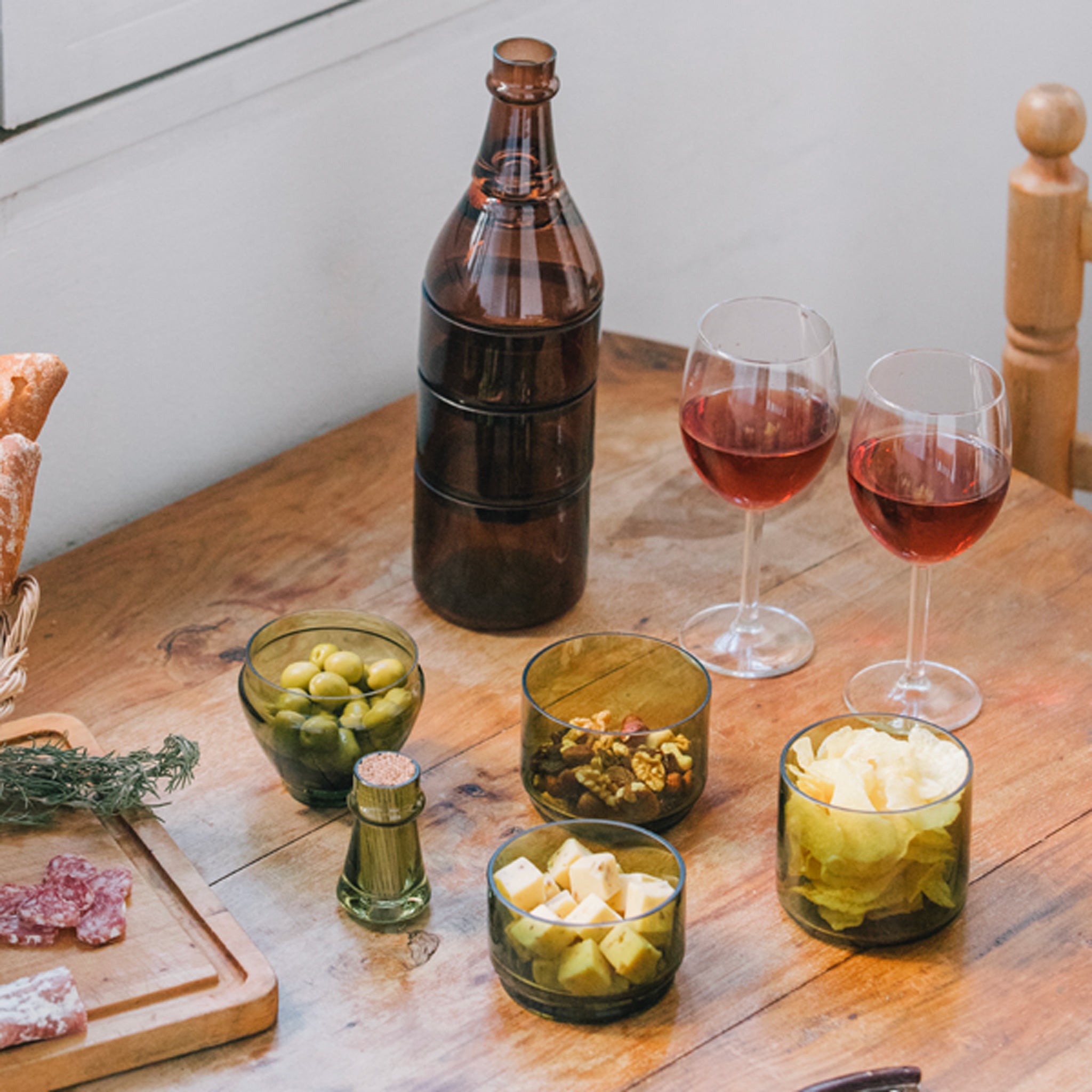 L'Apero Bottle in Amber on display table