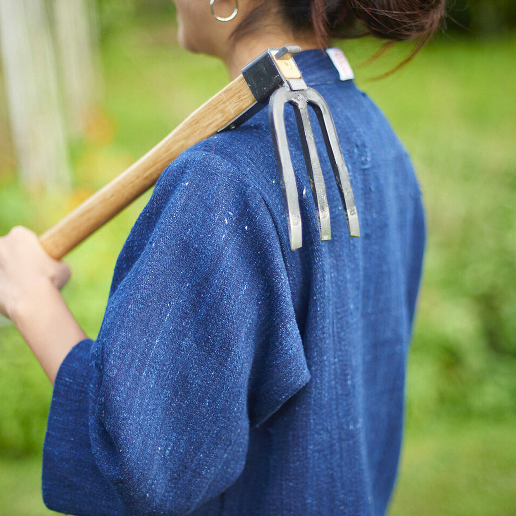 Niwaki Japanese Hand Fork on the shoulder of woman
