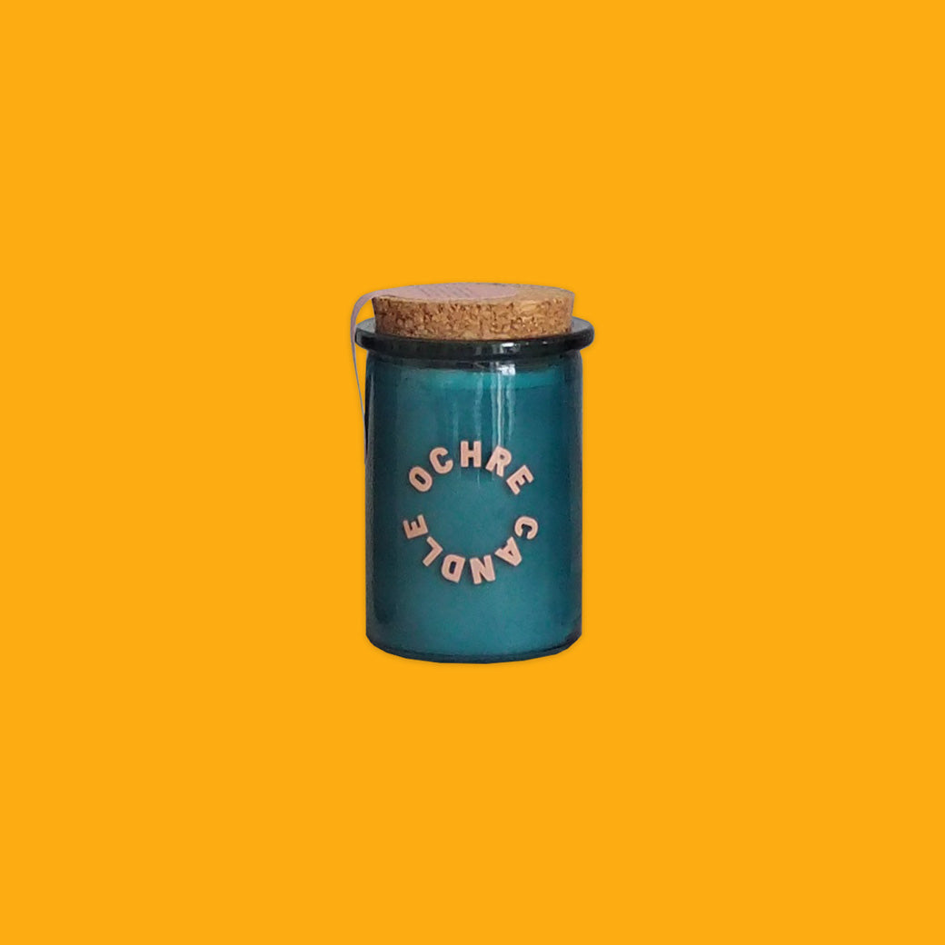 Ochre Soy Wax Candle in Geranium & Patchouli in a Blue Jar