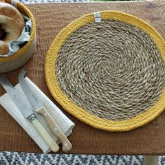 Seagrass & Jute Tablemat in Yellow on table