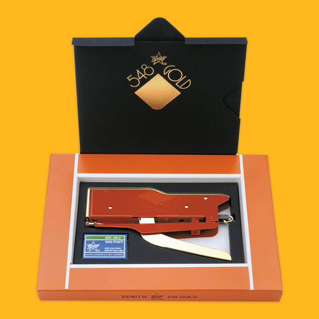 Zenith 548 Gold in red package with staples