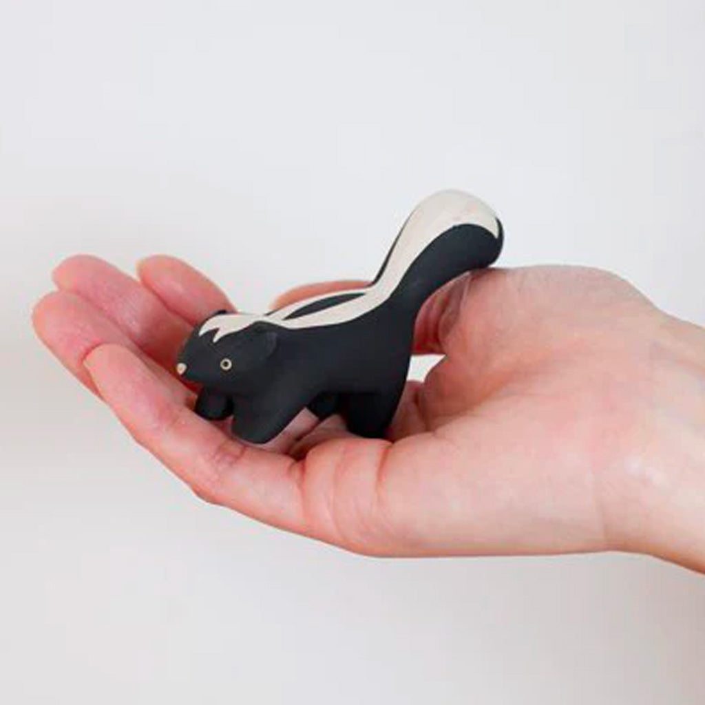 T-Lab Pole Pole Skunk in a persons hand