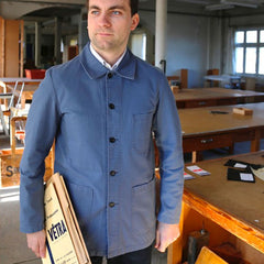 Man wearing a Vetra Men's Jacket 4 in Postman Blue