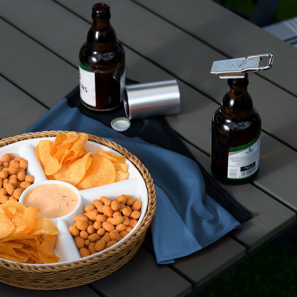 Westmark Monopol Hermetus Bottle Opener Sealer on a bottle on a table.